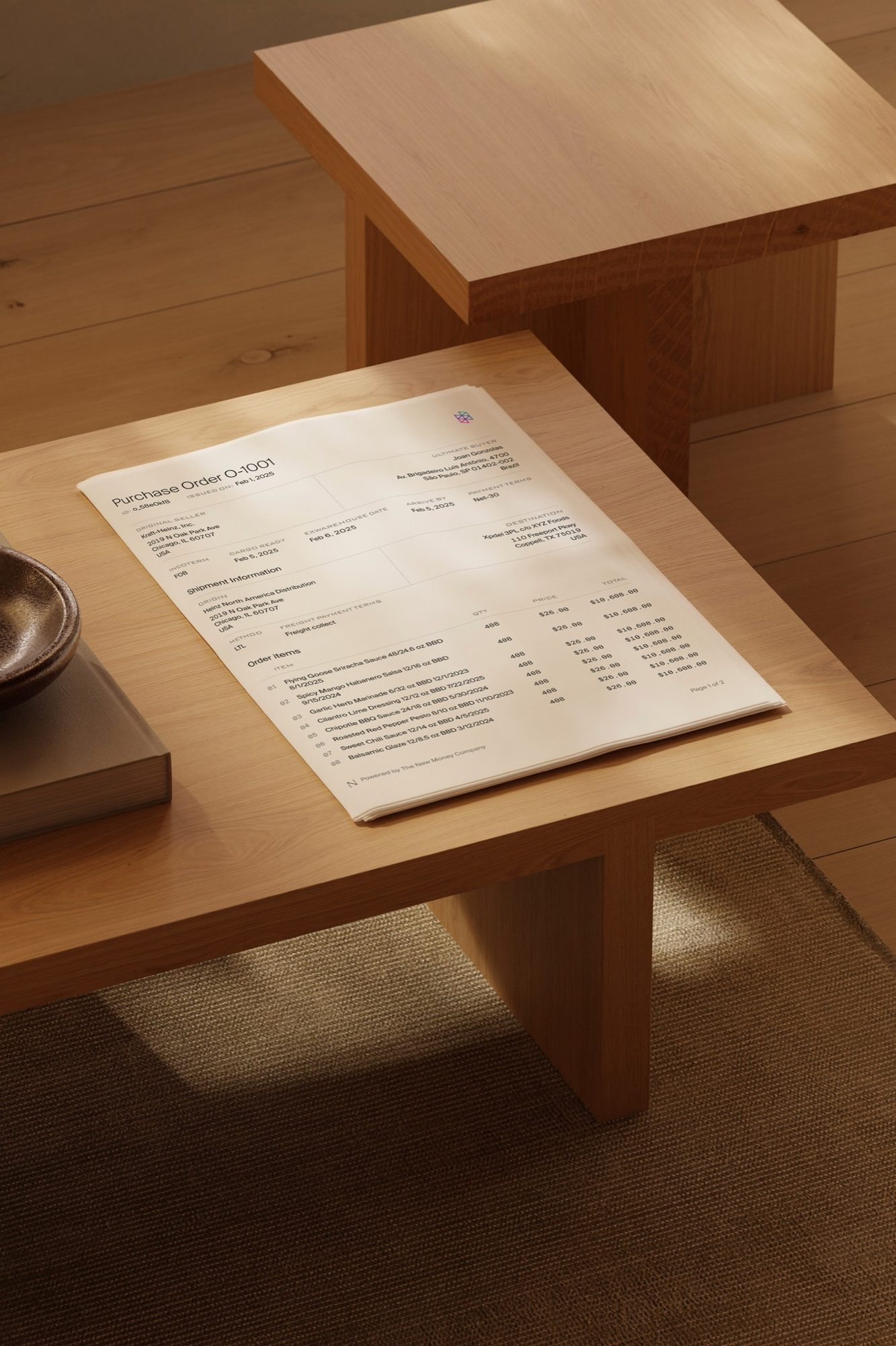 A purchase order the platform generated, printed and lying on an oak table — order O-1001, Net 30, routing seven lines of sauces from a Chicago seller to a buyer in São Paulo, footed “Powered by The New Money Company”